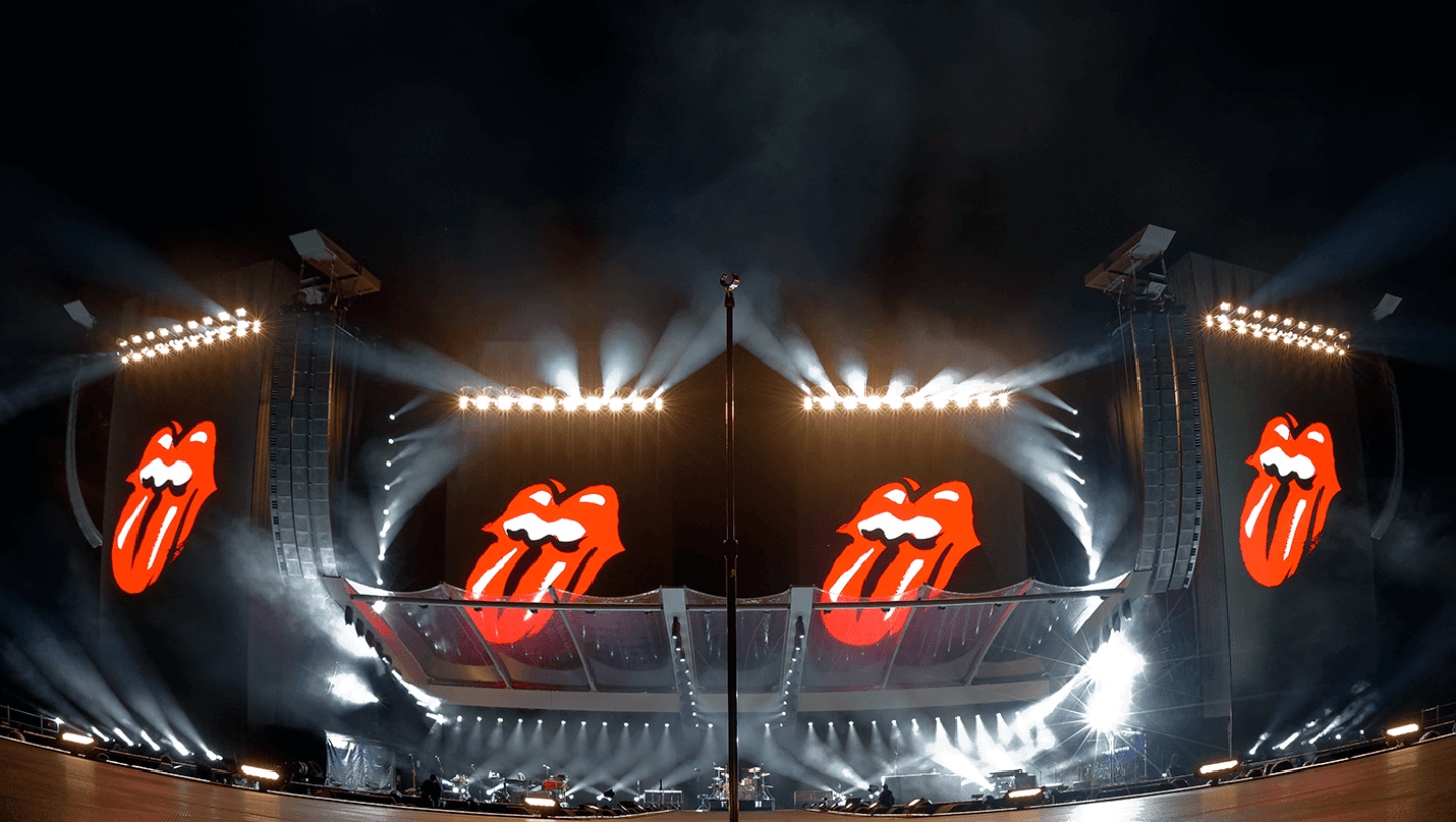 Stage set with Rolling Stones tongue logo displayed on screens